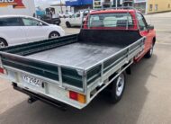 1999 Toyota HiLux. 2.7P, 2WD, Flat Deck